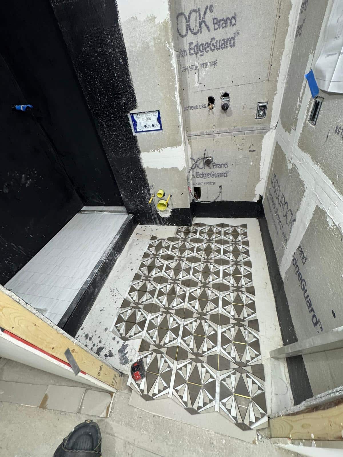 Bathroom flooring detail project photo 1 completed by LOKEIL Renovation in the New York City area.