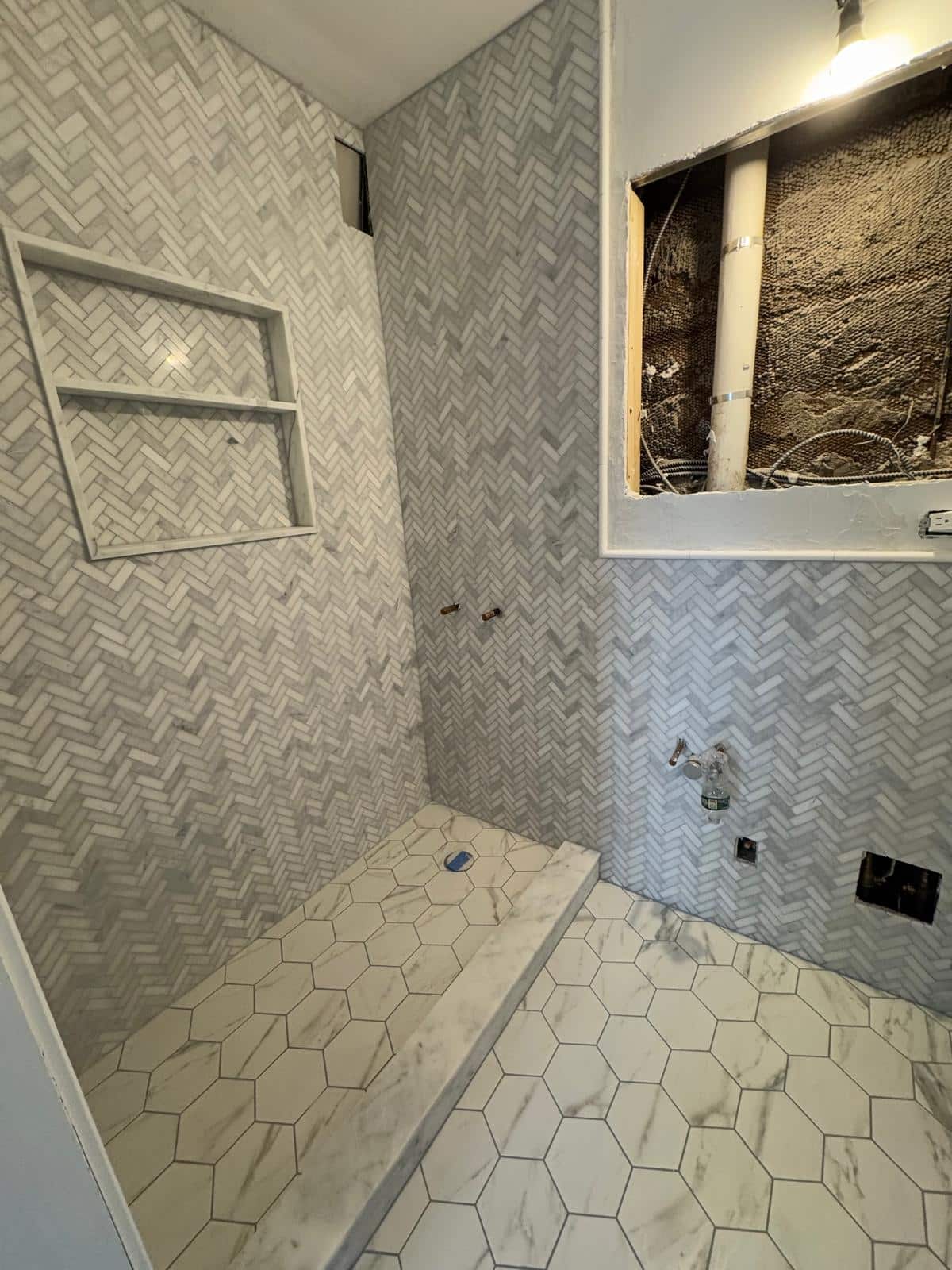 Bathroom flooring detail project photo 4 completed by LOKEIL Renovation in the New York City area.